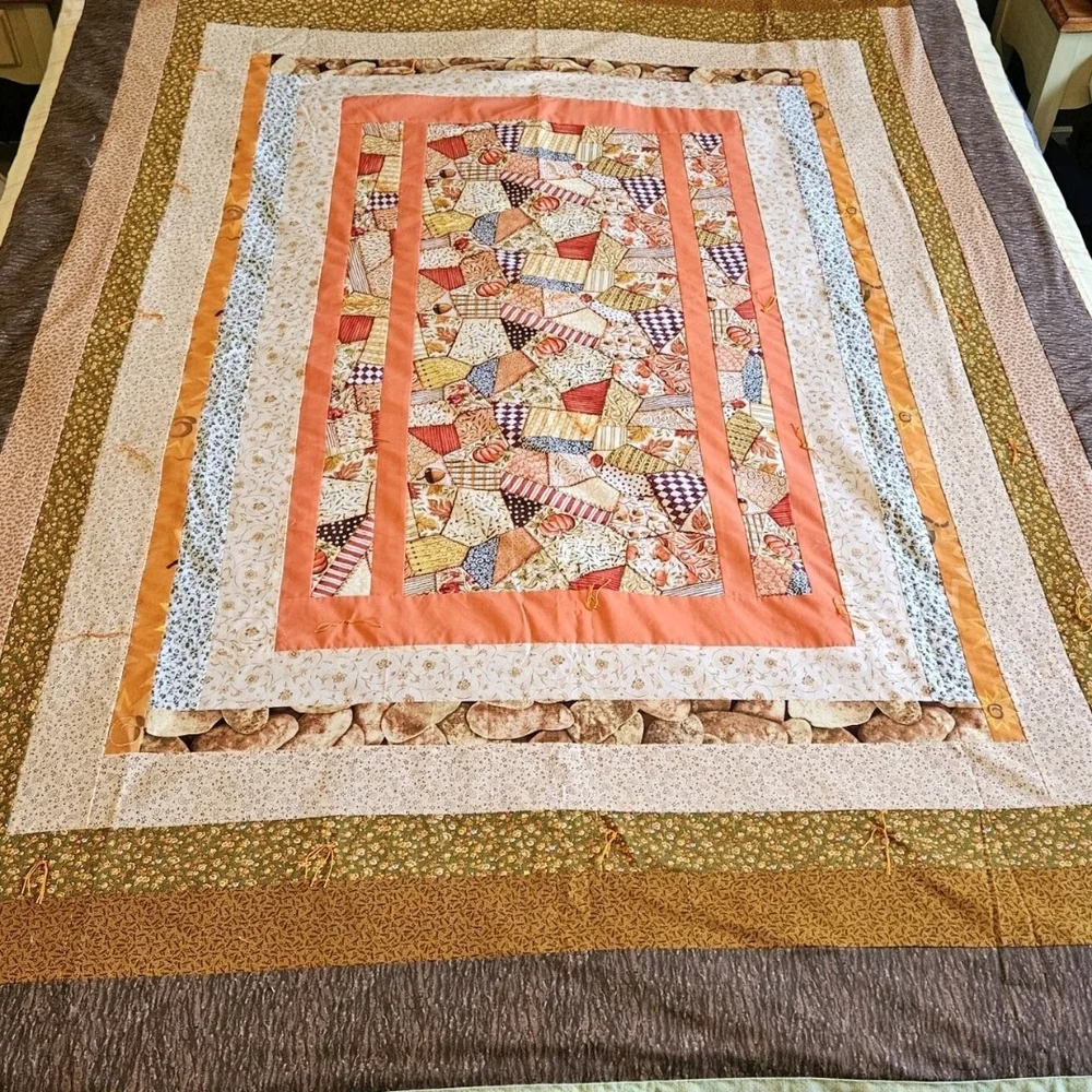NEW, never used 77" X 60" Fall Themed Quilt.  The color scheme Is fall themed. - Picture 2 of 5